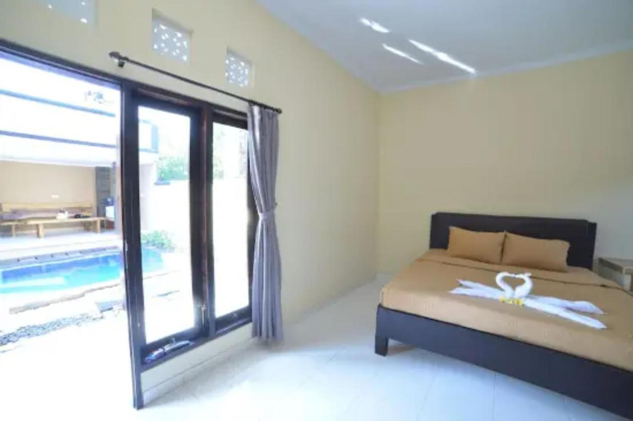 Kedunganan Oyo Flagship 91237 Ratu Guest House מראה חיצוני תמונה